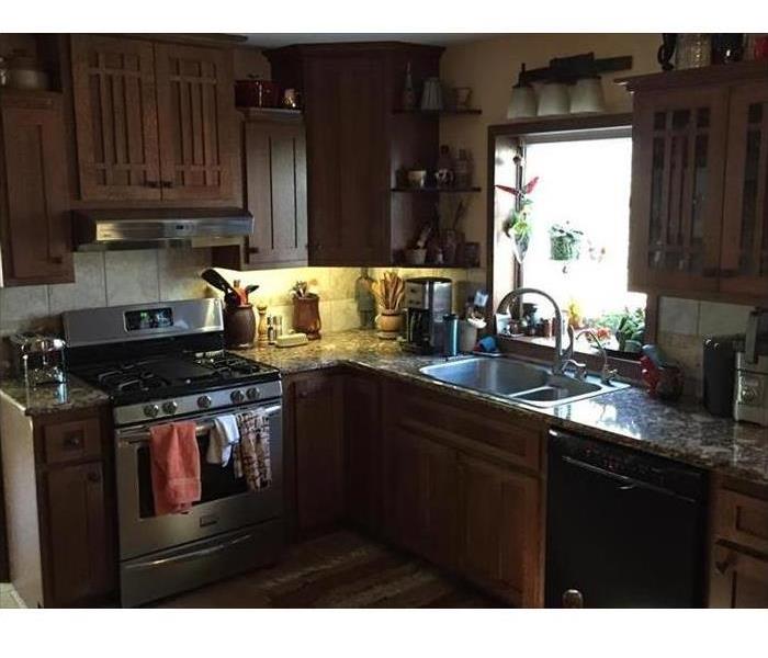 newly remodeled kitchen cabinets, countertops, and appliances