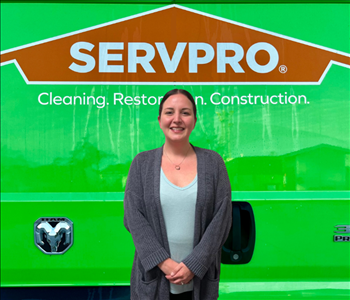 tech in front of Servpro van