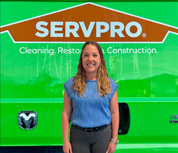 tech in front of SERVPRO® van